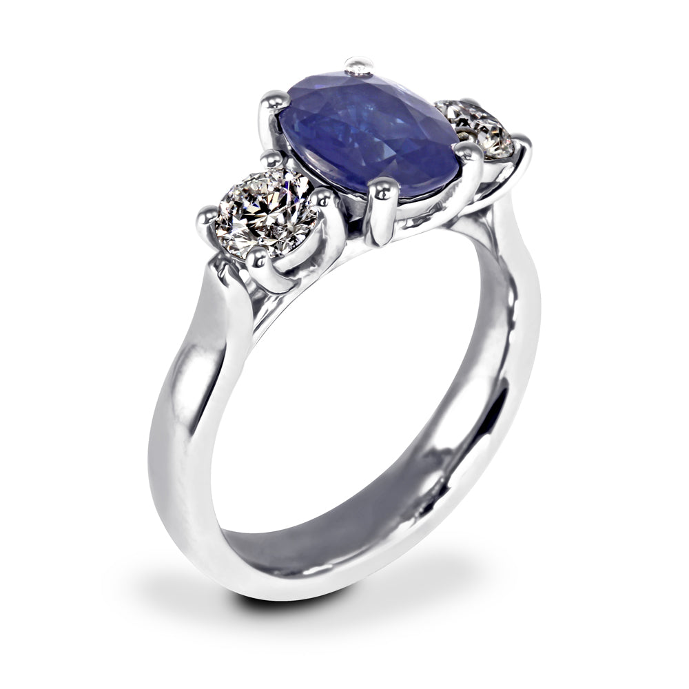 Diamond ring with two on sale sapphires