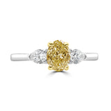 Platinum And 18ct Yellow Gold 1.02ct Oval Cut Yellow Diamond And 0.25ct Pear Cut Diamond Three Stone Ring