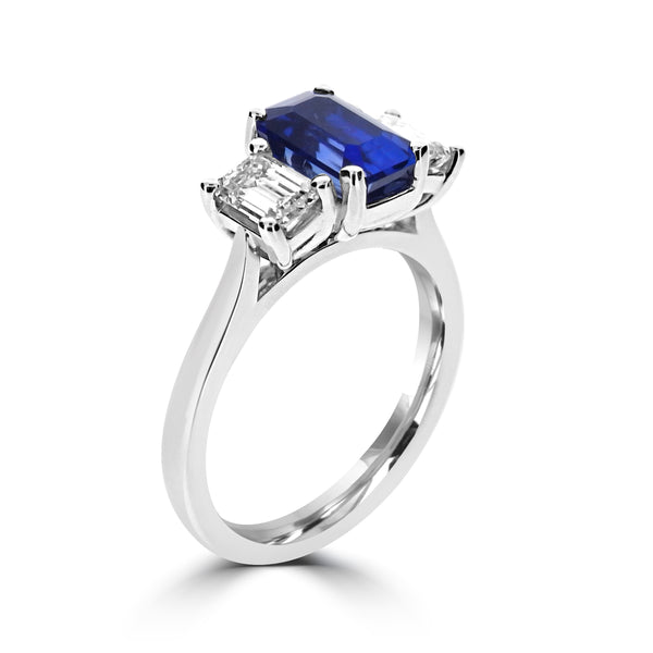 Platinum Emerald Cut 1.73ct Blue Sapphire And 1.04ct Diamond Three Stone Ring