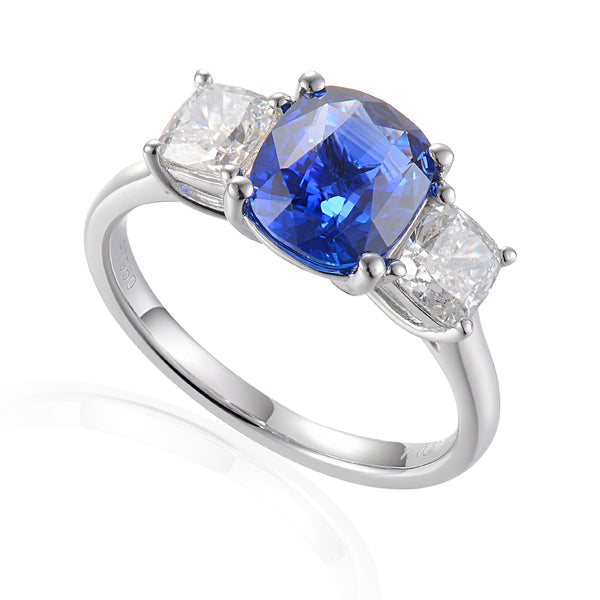 Platinum Cushion Cut 2.28ct Blue Sapphire And 1.02ct Diamond Three Stone Ring
