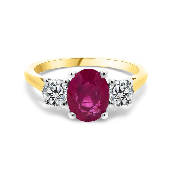 18ct Yellow And White Gold 1.48ct Oval Cut Ruby And 0.55ct Round Brilliant Cut Diamond Three Stone Ring