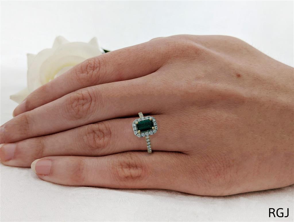 The Evie 18ct Yellow Gold And Platinum 0.93ct Emerald Cut Emerald Ring With 0.47ct Diamond Halo And Diamond Set Shoulders