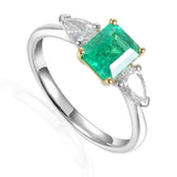 Platinum And 18ct Yellow Gold 0.86ct Octagon Cut Emerald And 0.38ct Pear Cut Diamond Three Stone Ring