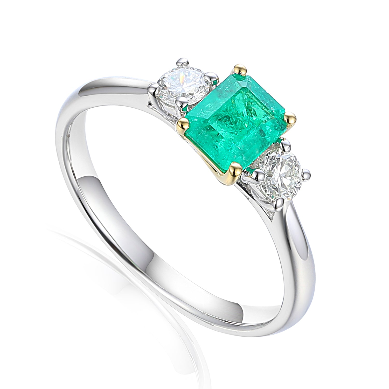 Platinum And 18ct Yellow Gold 0.51ct Octagon Cut Emerald And 0.27ct Round Brilliant Cut Diamond Three Stone Ring