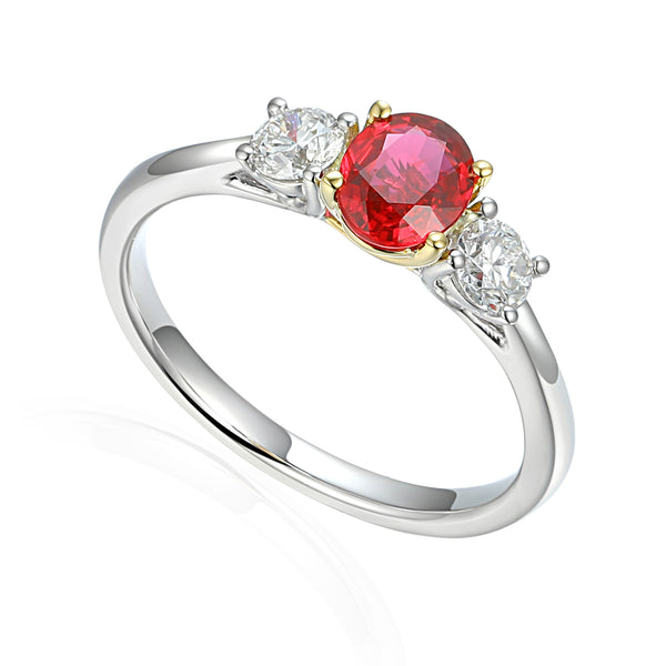 Platinum And 18ct Yellow Gold 0.67ct Oval Cut Ruby And 0.36ct Round Brilliant Cut Diamond Three Stone Ring