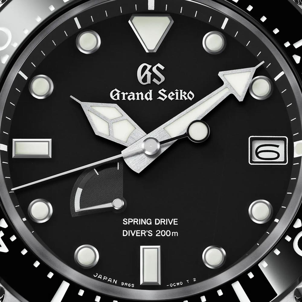 grand seiko sports collection spring drive divers 44mm black dial gents watch dial close up