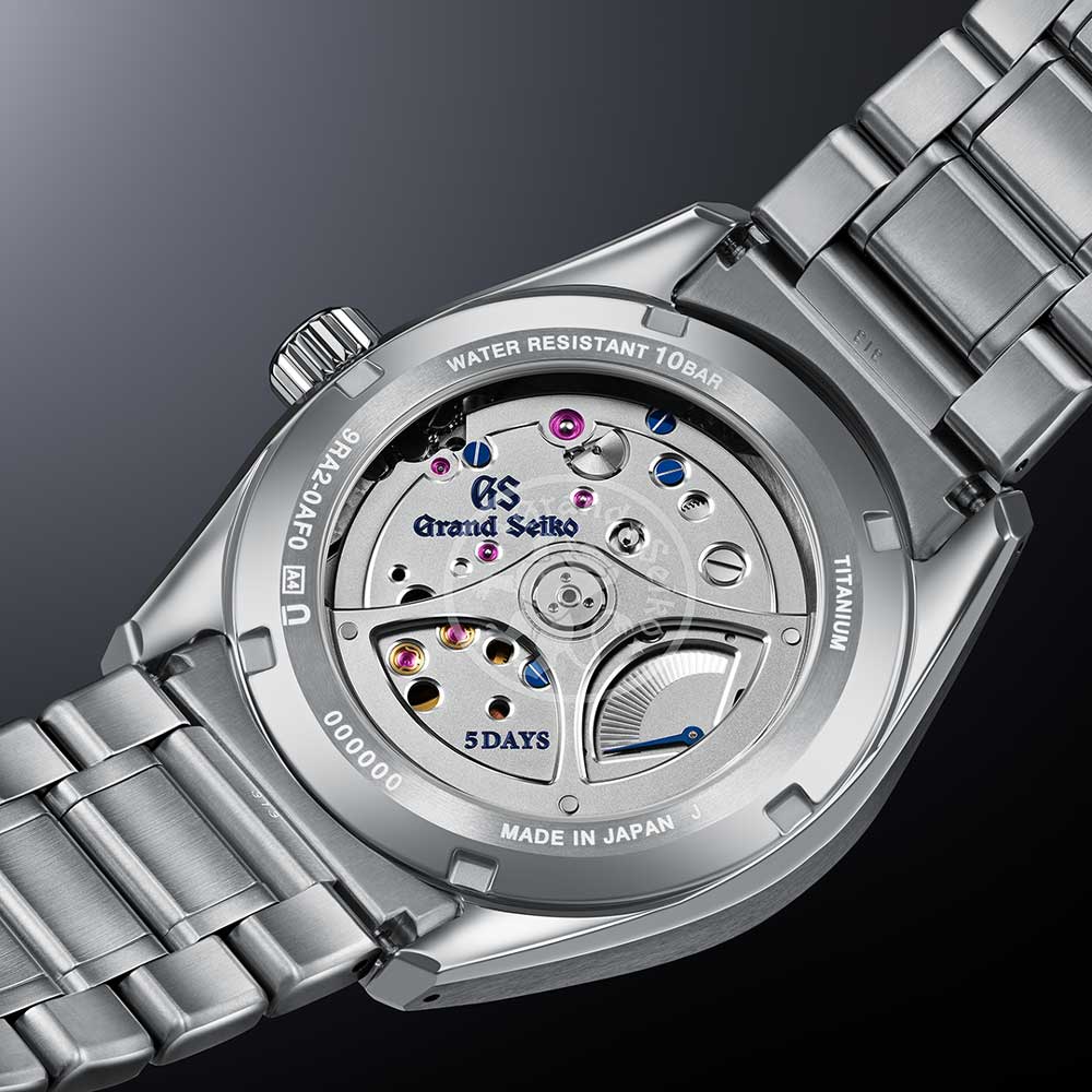 grand seiko evolution 9 spring drive suwa lake 40mm blue dial titanium gents watch case back view