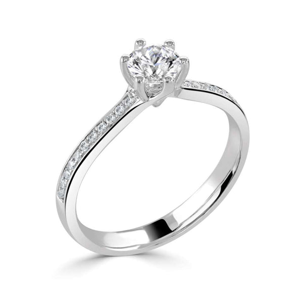 The Hibiscus Platinum Round Brilliant Cut Diamond Solitaire Engagement Ring With Diamond Set Shoulders